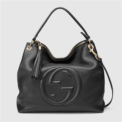 a passeggio con borsa gucci|Borse da donna Gucci .